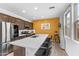 Stylish kitchen with a large island, quartz countertops, and stainless steel appliances at 25268 N 142Nd Dr, Surprise, AZ 85387