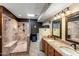 Well-lit bathroom features granite counters, dual sinks, and a step-in shower at 25621 N Cordova Ln, Rio Verde, AZ 85263