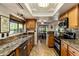 Well-equipped kitchen featuring granite countertops, stainless steel appliances, and abundant cabinet space at 25621 N Cordova Ln, Rio Verde, AZ 85263