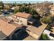 Aerial view of a charming home with a large yard and covered patio, perfect for outdoor entertaining at 2706 W Estrella Dr, Chandler, AZ 85224