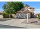 Two-story home with a well-maintained yard and a two-car garage at 2706 W Estrella Dr, Chandler, AZ 85224