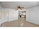 Open-concept living area with tiled floors and views of the modern kitchen at 2706 W Estrella Dr, Chandler, AZ 85224