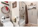 Rustic-themed bathroom featuring a shower-tub combo and unique Western-style decor accents at 2854 S Berrywood --, Mesa, AZ 85212