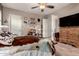 Charming bedroom featuring a cowboy-themed décor, wood flooring, and a ceiling fan at 2854 S Berrywood --, Mesa, AZ 85212