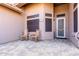 Front porch with rocking chairs and multicolored brick design at 2854 S Berrywood --, Mesa, AZ 85212