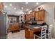 Spacious eat-in kitchen features stainless steel appliances, and plentiful cabinet storage at 2854 S Berrywood --, Mesa, AZ 85212