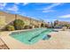 A beautiful pool with well-manicured desert-scape landscaping at 29740 W Fairmount Ave, Buckeye, AZ 85396