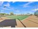 Well-maintained tennis courts offer residents the chance to engage in friendly competition amid scenic views at 29740 W Fairmount Ave, Buckeye, AZ 85396