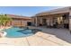 Private pool, covered patio, and cozy outdoor seating create an ideal outdoor space at 3034 E Coconino Dr, Gilbert, AZ 85298