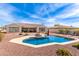 Sparkling pool and landscaped backyard create a resort-like ambiance for relaxation and outdoor enjoyment at 30488 N 126Th Dr, Peoria, AZ 85383