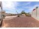 Large backyard featuring desert landscaping, a basketball court and a shimmering pool create an outdoor oasis at 30488 N 126Th Dr, Peoria, AZ 85383