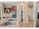 Kitchen with granite countertops, stainless steel appliances and a walk in pantry at 30488 N 126Th Dr, Peoria, AZ 85383