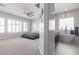 View of the main bedroom suite and bathroom with a soaking tub and modern finishes at 30488 N 126Th Dr, Peoria, AZ 85383