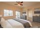 Serene main bedroom with a balcony, calming colors, and ample natural light at 320 N 168Th Dr, Goodyear, AZ 85338