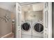 Bright laundry area featuring front loading washer and dryer and fun decor at 3655 N 5Th Ave # 213, Phoenix, AZ 85013