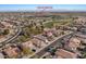 Aerial view of home in the Seville Golf and Country Club neighborhood with lush landscaping at 3746 E Vallejo Dr, Gilbert, AZ 85298