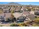 Aerial view of a private backyard oasis, featuring a sparkling pool and lush landscaping at 3746 E Vallejo Dr, Gilbert, AZ 85298