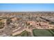 Aerial view of a community center with beautiful landscaping, pool, and golf course at 3746 E Vallejo Dr, Gilbert, AZ 85298