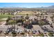 Scenic aerial view of the community center, golf course, and manicured landscaping at 3746 E Vallejo Dr, Gilbert, AZ 85298