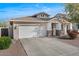 Charming single-story home with a two-car garage and well-manicured front yard at 3746 E Vallejo Dr, Gilbert, AZ 85298