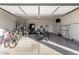 Garage equipped with exercise equipment and bike storage racks at 3923 S 244Th Dr, Buckeye, AZ 85326