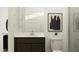 Clean bathroom with a dark wood vanity, framed mirror, and modern fixtures at 4583 E French Rd, San Tan Valley, AZ 85143