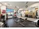 Well-equipped gym with weights, machines, and mirrors for a complete workout experience at 4931 N Woodmere Fairway -- # 1001, Scottsdale, AZ 85251