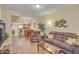 Inviting living room with wood flooring, neutral colors and a comfortable seating arrangement at 537 S Delaware Dr # 115, Apache Junction, AZ 85120