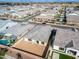 Aerial view of a home and surrounding neighborhood with streets, similar houses, and bare backyards at 6336 S Granite St, Gilbert, AZ 85298