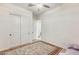 Bright bedroom featuring a spacious closet, neutral walls and an elegant area rug at 6336 S Granite St, Gilbert, AZ 85298