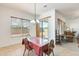 Cozy dining area with slider doors and a view to the living room, ideal for gatherings at 6336 S Granite St, Gilbert, AZ 85298