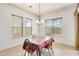 Inviting dining room with natural light and seating for four, perfect for Gathering meals at 6336 S Granite St, Gilbert, AZ 85298