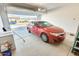 Clean two-car garage with an open door, perfect for parking and storage at 6336 S Granite St, Gilbert, AZ 85298