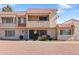 Charming multi-level townhome featuring a red tile roof, a private balcony, and well-maintained landscaping at 6345 N 49Th Ave, Glendale, AZ 85301