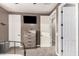 Bedroom featuring a dresser, mounted television, and neutral colors at 65 W Cucumber Tree Ave, San Tan Valley, AZ 85140