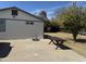 Backyard featuring the side of the house and a picnic table at 6532 N 60Th N Ave, Glendale, AZ 85301