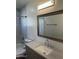 Nicely styled bathroom including tiled walls, a shower-tub combination, and modern vanity at 6532 N 60Th N Ave, Glendale, AZ 85301