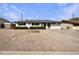 Charming single-story home with a well-manicured lawn and inviting curb appeal at 7020 E Oak St, Scottsdale, AZ 85257