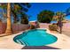 Private backyard pool featuring a classic shape, tile accents, and a surrounding patio space at 7456 E Milagro Ave, Mesa, AZ 85209