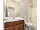 A functional bathroom features a single sink vanity and a shower-tub combo at 757 E Lovegrass Dr, San Tan Valley, AZ 85143