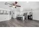 Spacious living room featuring vinyl floors and stainless steel appliances at 7645 E Gale Ave, Mesa, AZ 85209