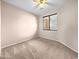 Bedroom featuring carpet flooring, light colored walls, and a window at 801 S 120Th Ave, Avondale, AZ 85323