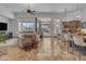 Bright, open living area with seamless indoor-outdoor flow and a view of the desert landscape at 8320 E Arroyo Hondo Rd, Scottsdale, AZ 85266