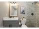 Updated bathroom featuring a glass shower, vanity, and modern fixtures for a fresh, clean feel at 8640 E Dianna Dr, Scottsdale, AZ 85254