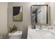 Modern bathroom with a sleek vanity, stylish mirror, and contemporary decor at 8640 E Dianna Dr, Scottsdale, AZ 85254