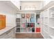 Bright and well-organized walk-in closet features shelves, drawers, and hanging space at 9005 E Grandview Dr, Mesa, AZ 85207