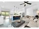 Open-concept living space featuring an eat-in kitchen with center island flowing to a comfortable and inviting seating area at 9739 E Pershing Ave, Scottsdale, AZ 85260