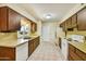 Efficient kitchen featuring matching appliances and ample cabinet space at 9813 W Pleasant Valley Rd, Sun City, AZ 85351