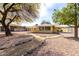 Charming home with low maintenance desert landscaping and a welcoming walkway at 10118 W Concho Cir, Sun City, AZ 85373