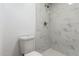 Updated bathroom with marble-style tiled walk-in shower and white hexagonal floor tiling at 1021 S Greenfield Rd # 1001, Mesa, AZ 85206